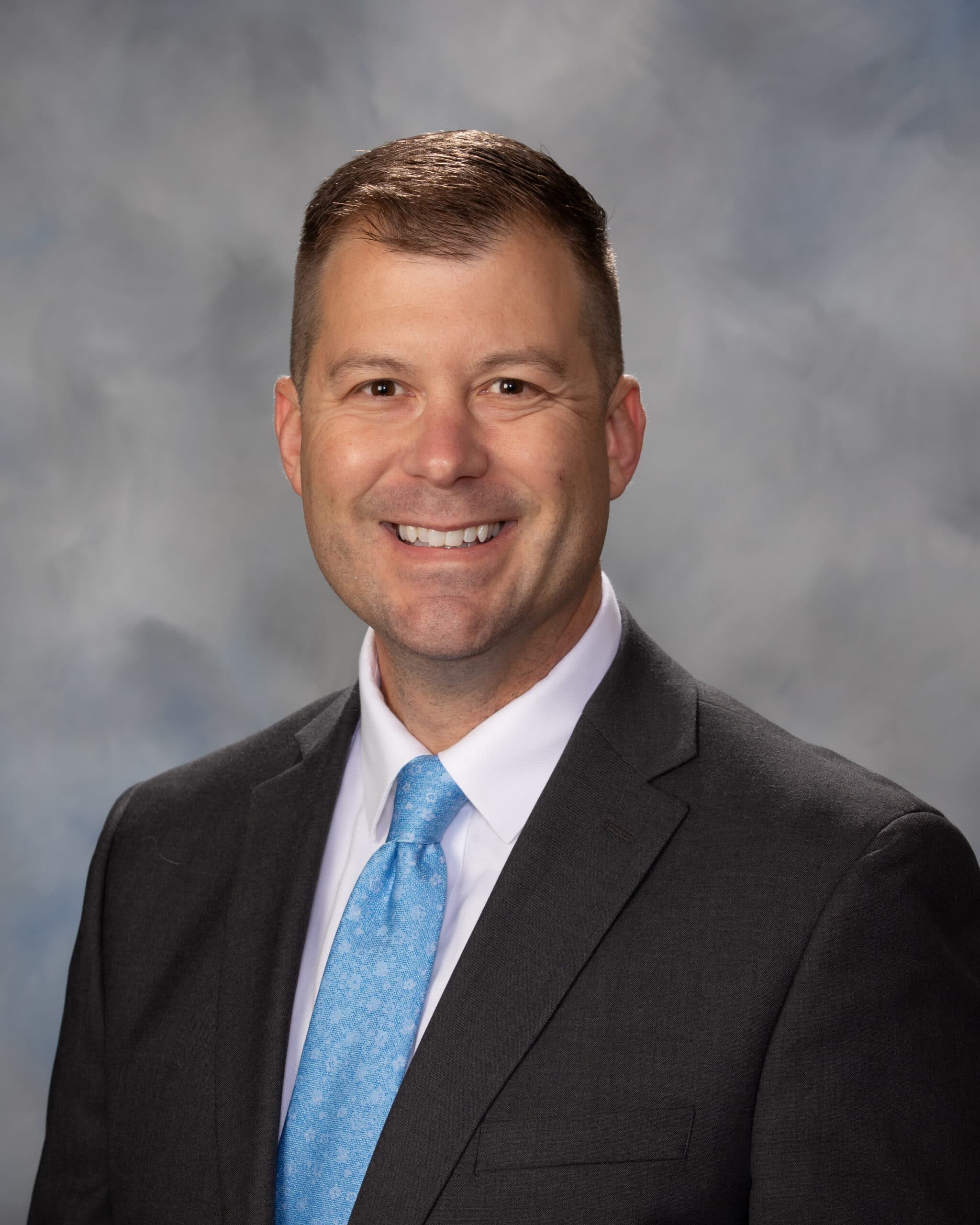 Affordable housing advocate Jeffrey Promnitz, smiling in a professional portrait, representing NAHMA.